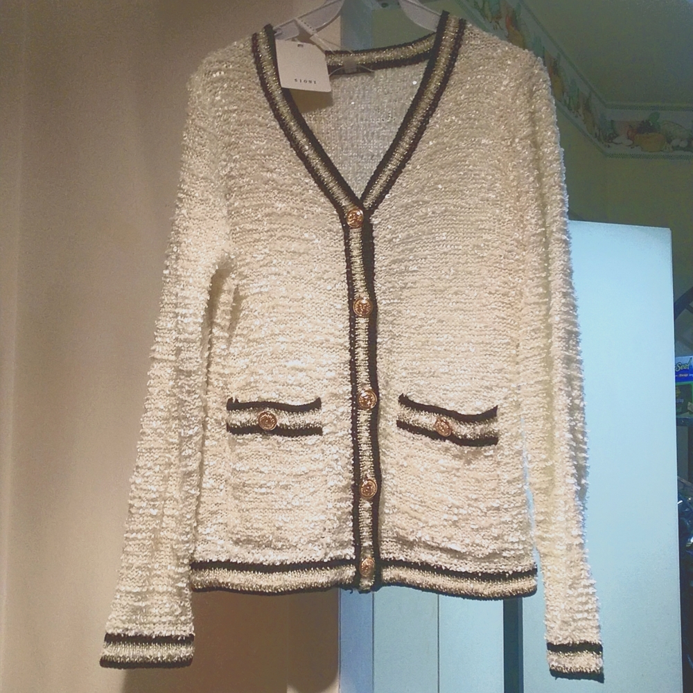 Cardigan with gold button accents to pockets